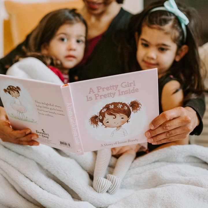 A pretty girl board book brown hair